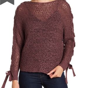Jolt lace-up dolman sleeve sweater